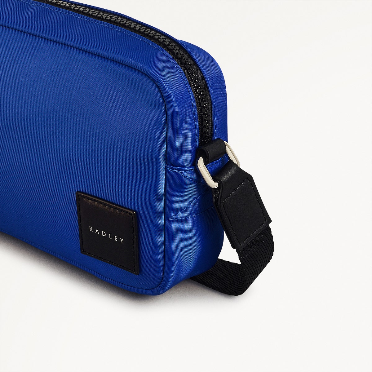 Yves Blue Mini Zip Around Crossbody | Blair Crescent Responsible
