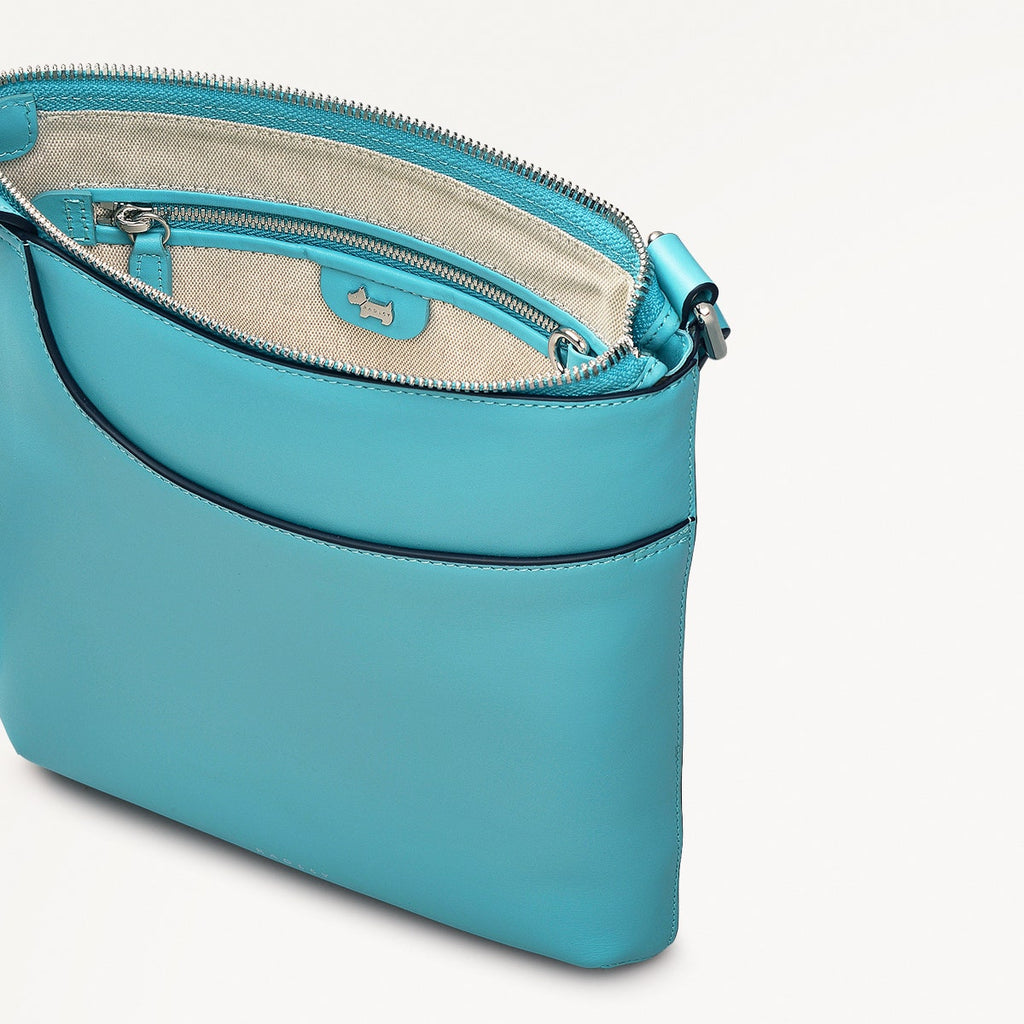 Pockets Leather Medium Ziptop Cross Body Bag in Maldives - 111449