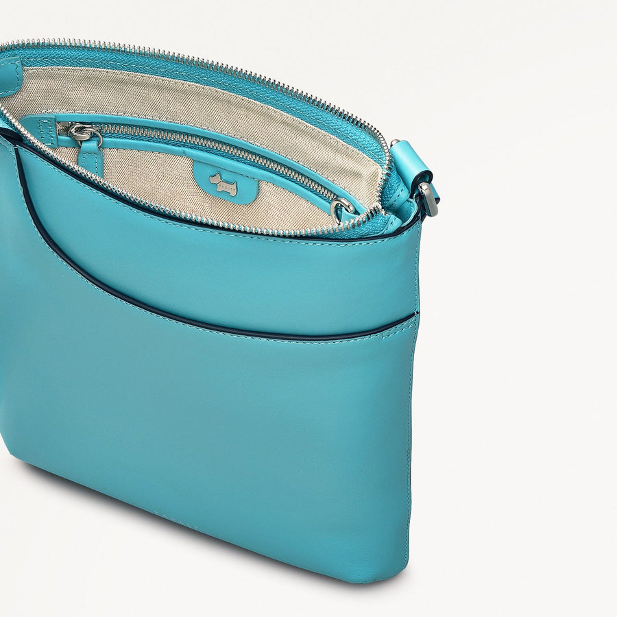 Pockets Leather Medium Ziptop Cross Body Bag in Maldives - 111449