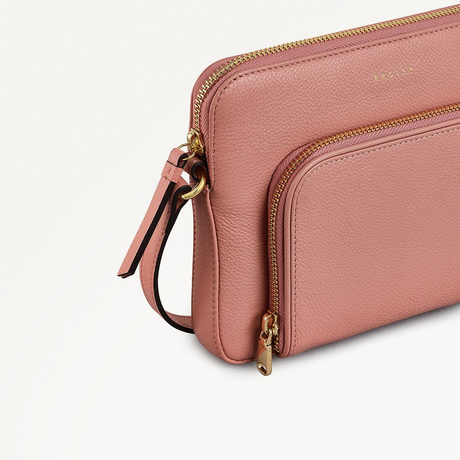 Redford Close Leather Small Ziptop Cross Body Bag in Sienna Pink - 111837