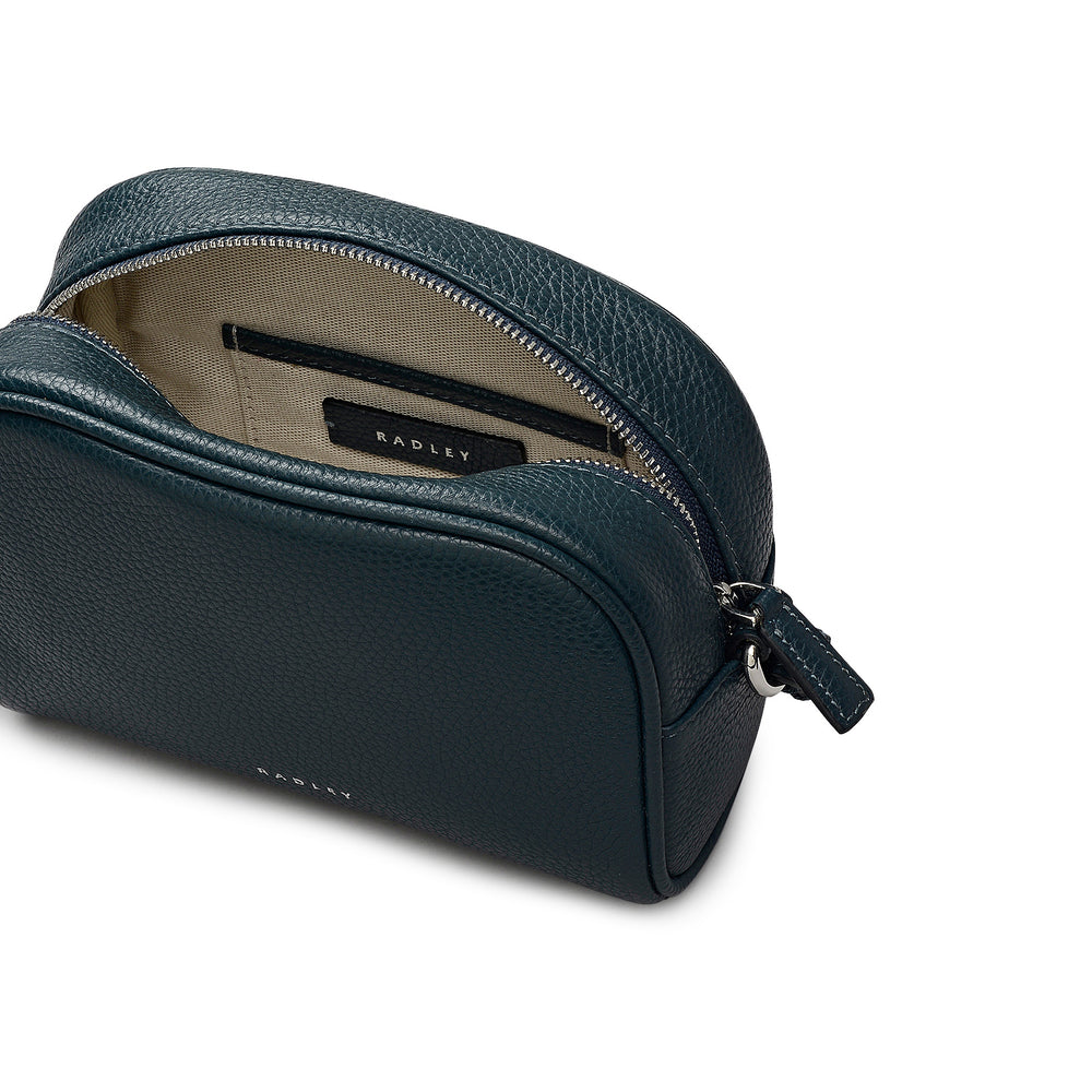 THE DAILY SMALL ZIP AROUND CROSS BODY TEAL