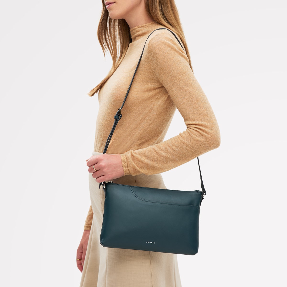 Pockets Leather Medium Ziptop EW Cross Body Bag in Teal - 112137