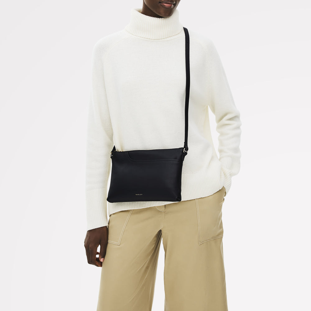 Pockets Leather Medium Ziptop EW Cross Body Bag in Black - 112145