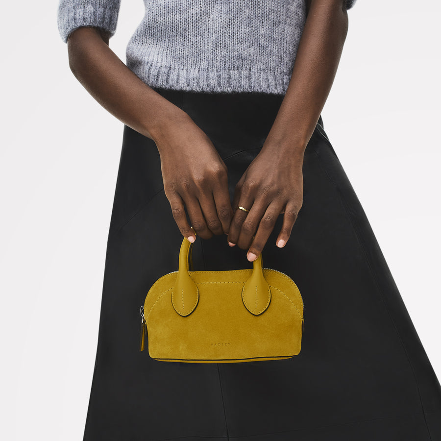 The Muriel Leather Micro Ziptop Grab Bag in Ochre - 112297