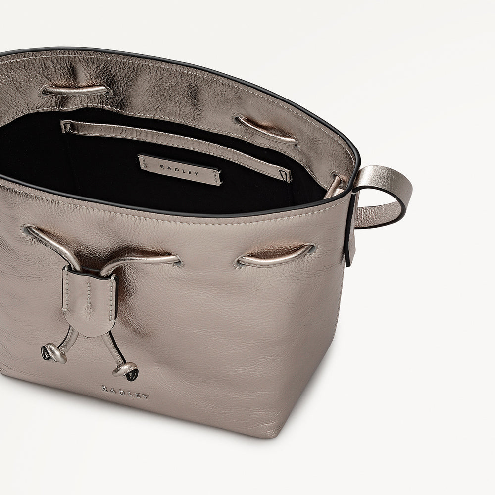 YORK MEWS - METALLIC SMALL DRAWSTRING SHOULDER PYRITE