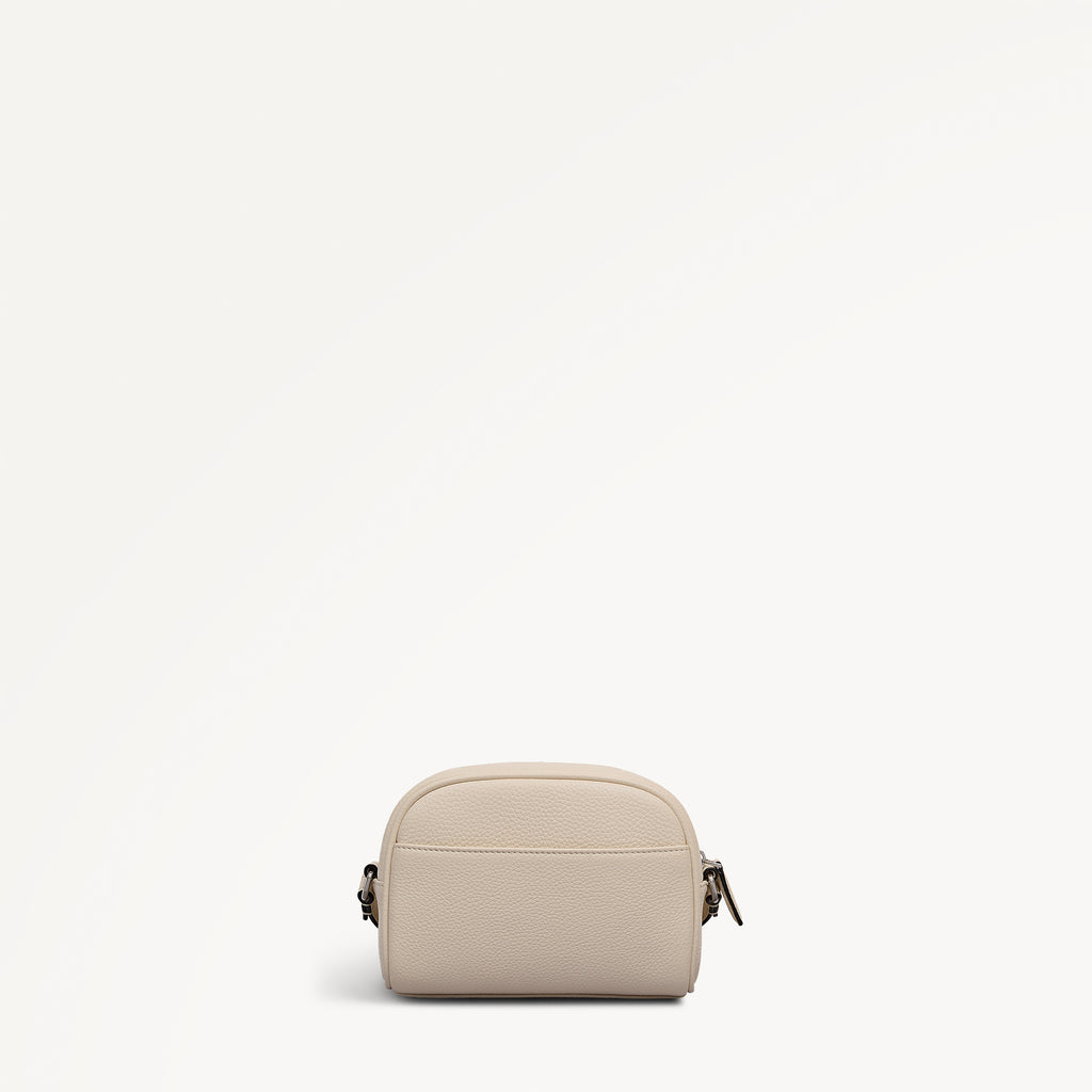THE DAILY SMALL ZIP AROUND CROSS BODY SALT