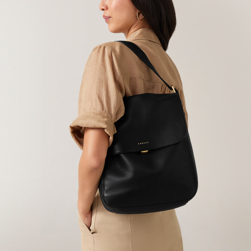 black leather shoulder bag backpack Women's Black Leather Backpack | Grafton Street AW24