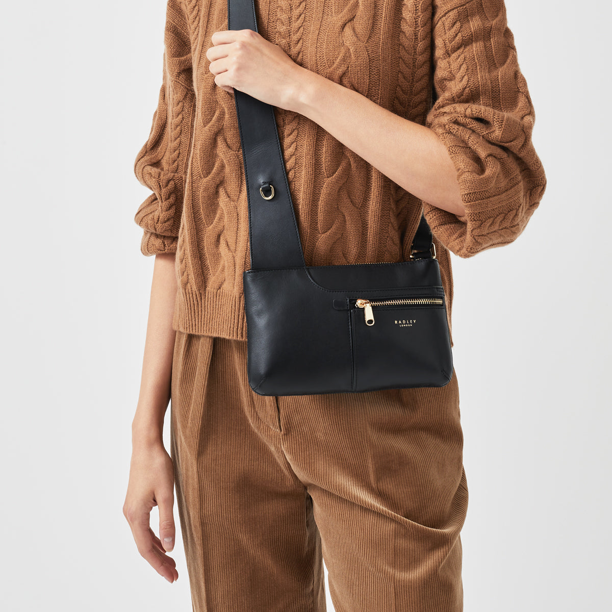 Pockets Leather Mini Ziptop Crossbody Bag in Black - H8848001