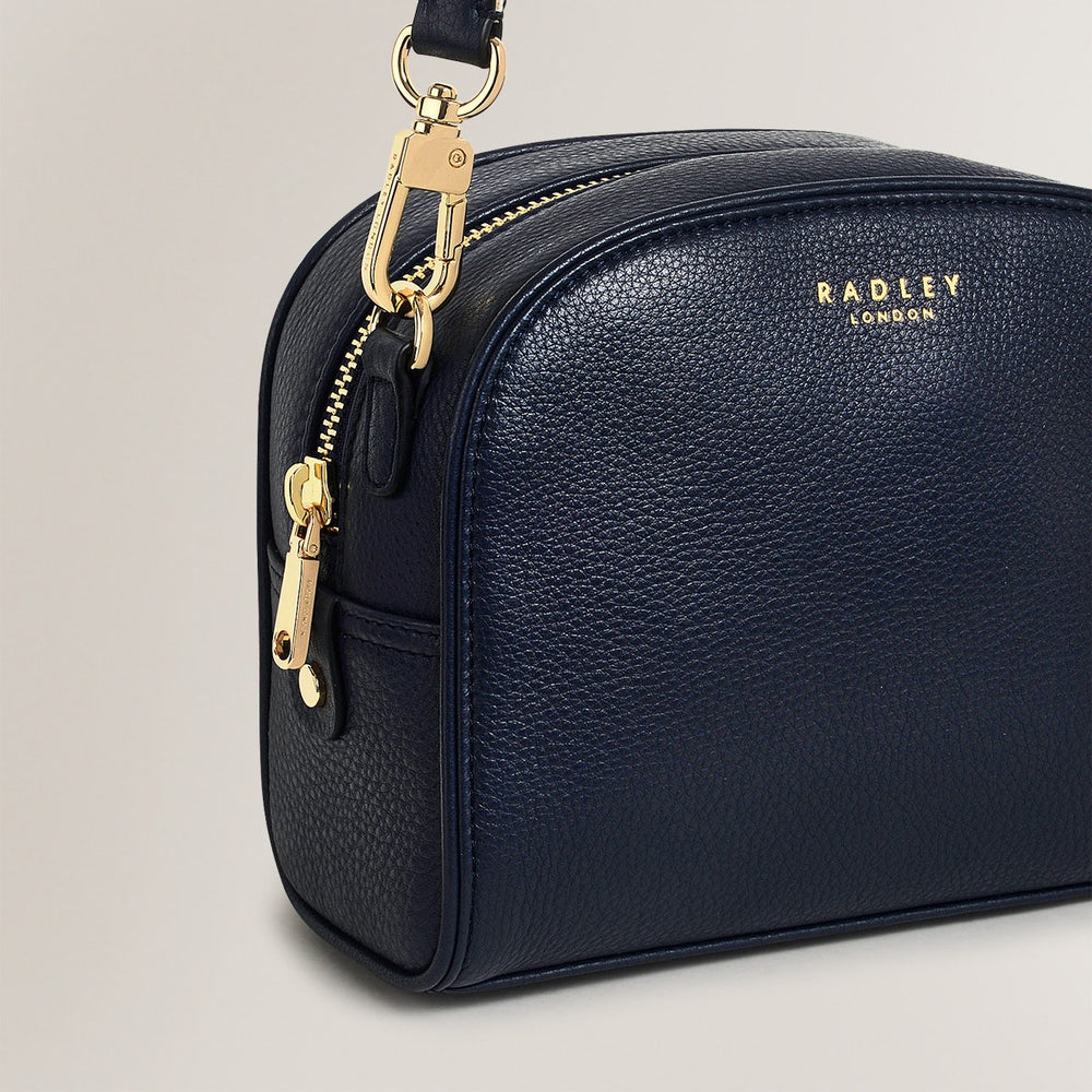 Arden Crescent Leather Small Zip Around Crossbody Bag in Ink - H1304401