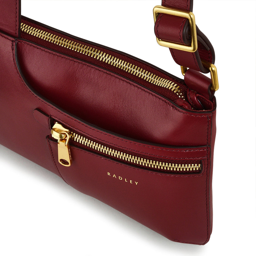 Pockets Leather Mini Ziptop Crossbody Bag in Cranberry - H2130604