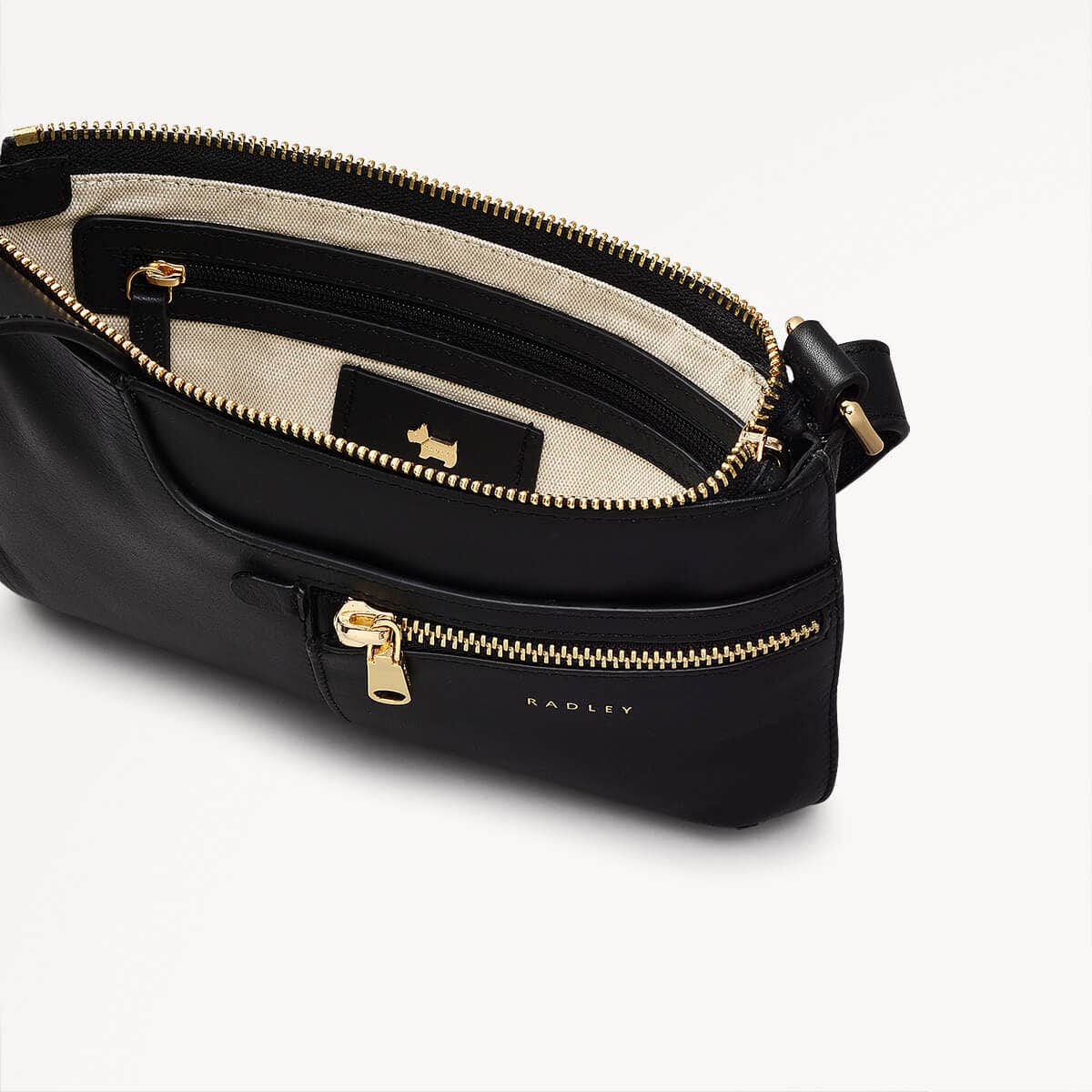Pockets Leather Mini Ziptop Crossbody Bag in Black - H8848001